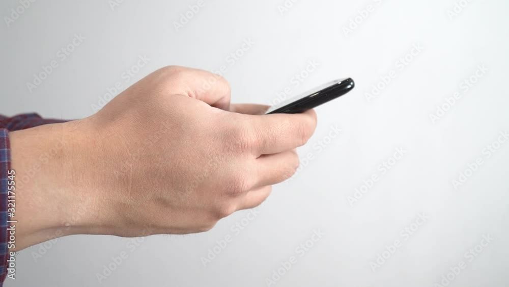 Phone charging cable tangled around the hand isoalted Phone charging cable tangled around the hand isoalted