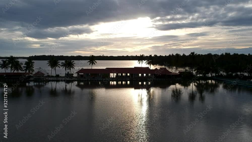 Beautiful sunset in Vembanad lake silhouette sky aerial view,resort,Asia tourism,sky