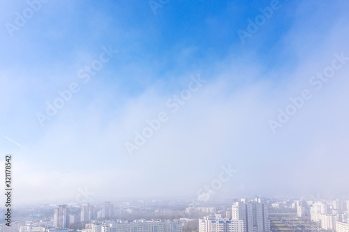 aerial view of Minsk cityscape on a foggy day. residential area. urban background