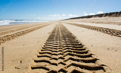 Tyre marks on the beash, Australia photo