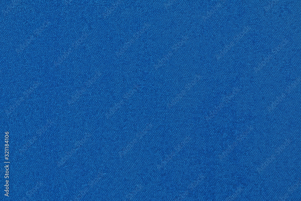 Blue natural cotton towel background, closeup texture