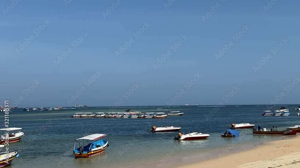 Nusa Dua, Beautiful Beach and Sky with Small House on Barrier, Bali Island Nusa Dua, Beautiful Beach and Sky with Small House on Barrier, Bali Island