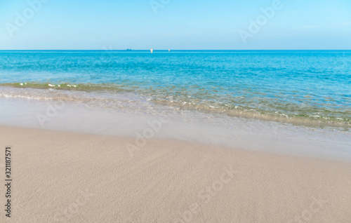 Tropical sea beach with sand and wave of the sea © Hanoi Photography