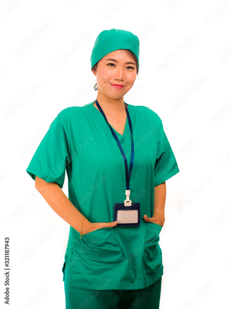 isolated portrait of young beautiful and happy Asian Chinese medicine doctor woman or hospital nurse in medical hat and scrub smiling cheerful and positive in health care isolated portrait of young beautiful and happy Asian Chinese medicine doctor woman or hospital nurse in medical hat and scrub smiling cheerful and positive in health care