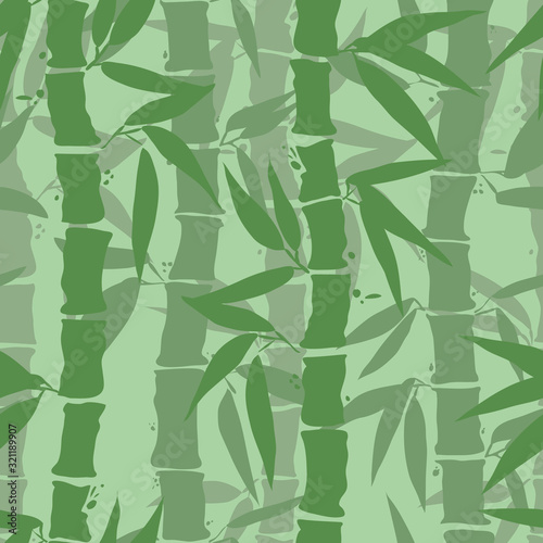 Bamboo leaf seamless pattern in green tones colors. Best for textile, wrapping or print design. Hand drawn bamboo background with paint texture.