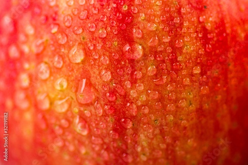 Water drops on apple surface - Apple texture - fresh apple © Ashvinth