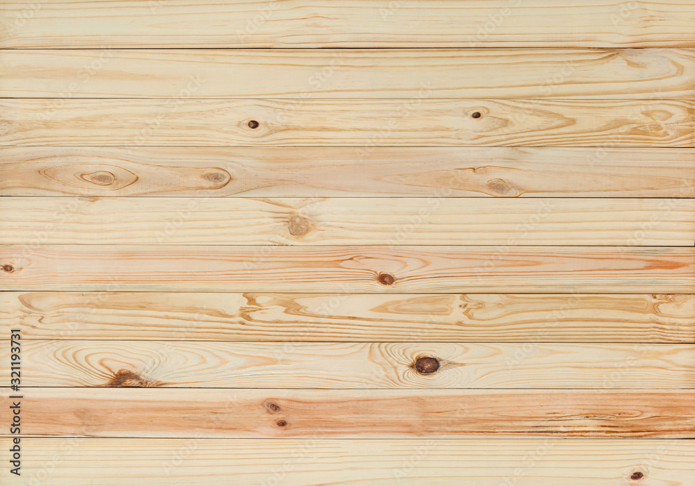 Fototapeta premium Empty difference brown shade colored of planks wooden board background. Beautiful mixed texture and pattern panels from reused old wood pallet. Image for natural material or mock up display concept.