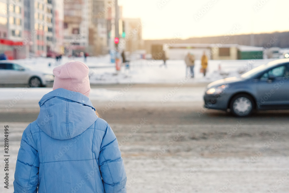Girl in a knitted hat in winter. Girl in a knitted hat in winter.
