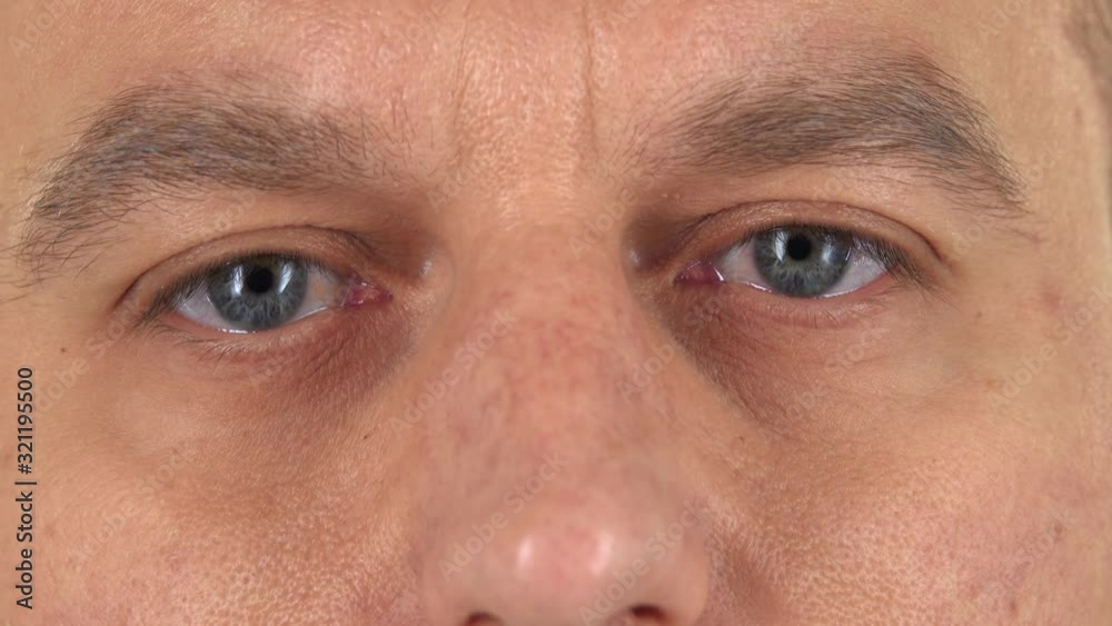 Frightened eyes of a man, close-up Frightened eyes of a man, close-up