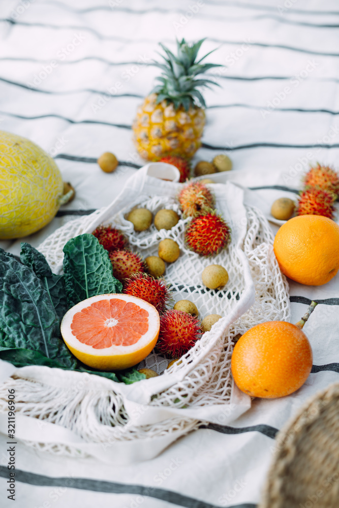 Naklejka various exotic fruits on the blanket,