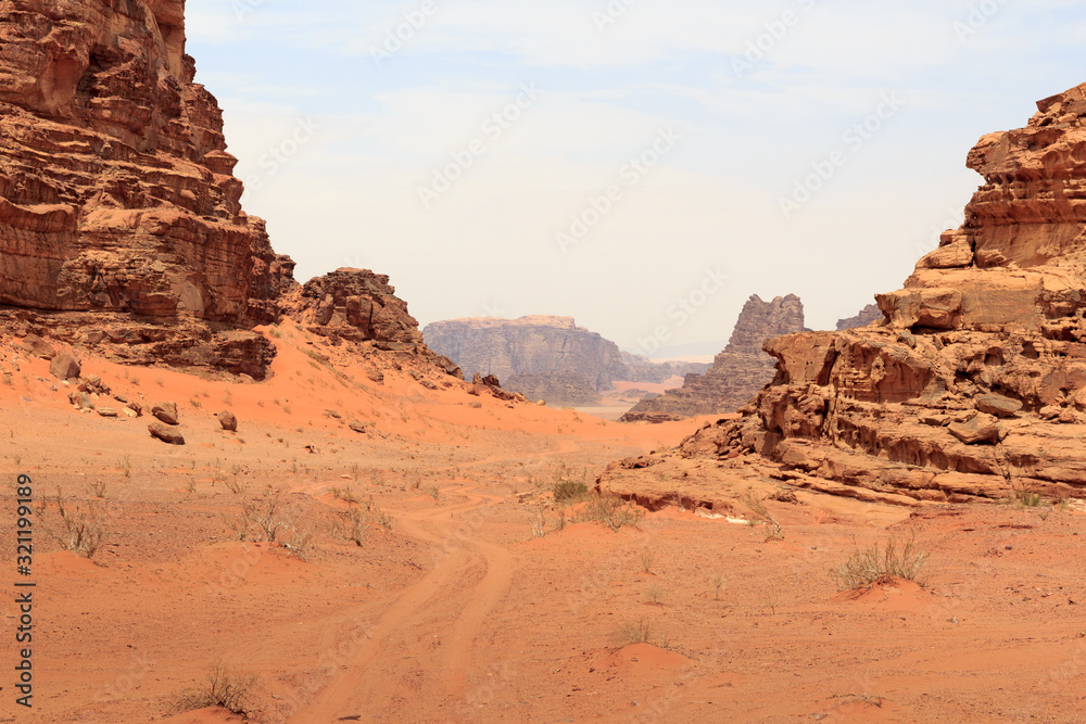 Wadi Rum desert panorama with dunes, mountains and sand that looks like planet Mars surface, Jordan