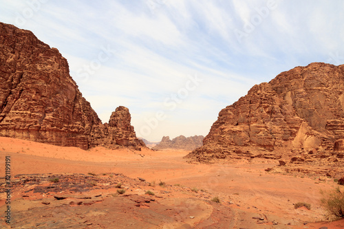 Wadi Rum desert panorama with dunes  mountains and sand that looks like planet Mars surface  Jordan
