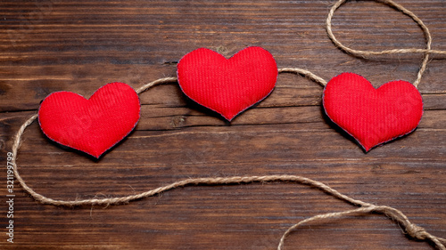 Handmade red heart near rope. Valentine's Day cardHandmade red heart near rope. Valentine's Day card_