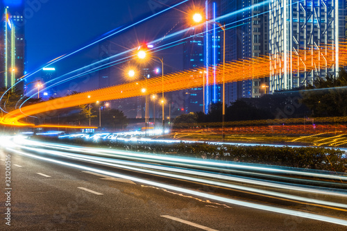 traffic with blur light through city at night.