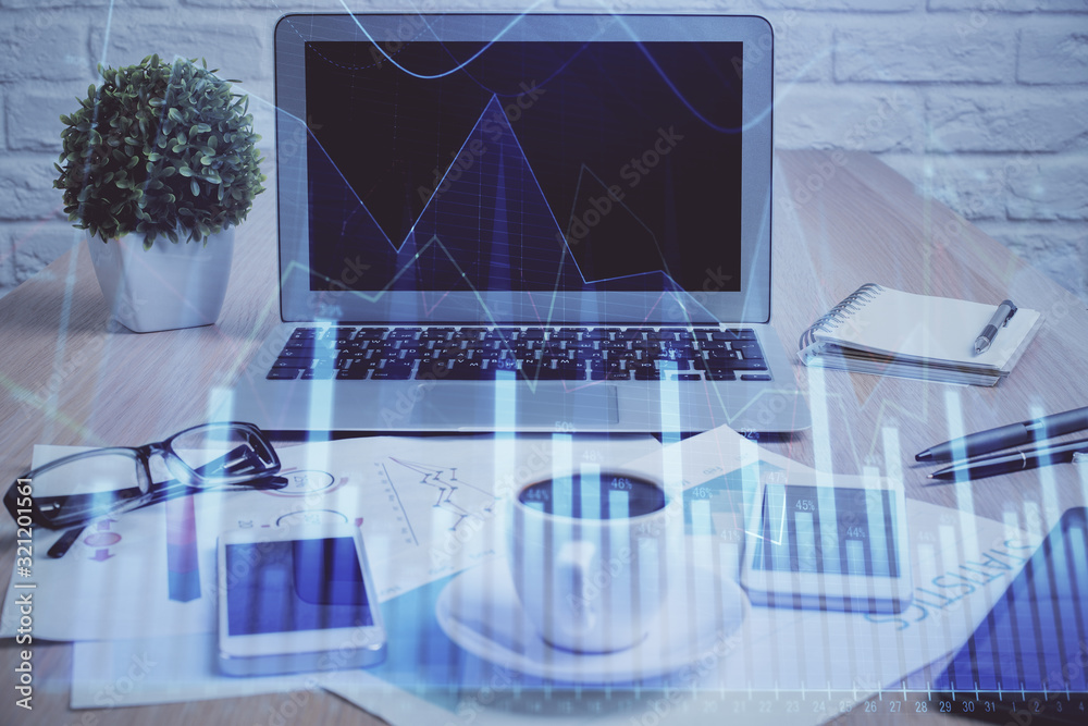 Stock market graph and table with computer background. Double exposure. Concept of financial analysis. Stock market graph and table with computer background. Double exposure. Concept of financial analysis.