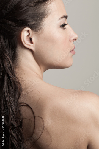 natural beauty concept young woman with wet hair profile and back studio shot