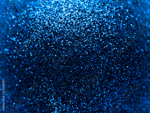 Abstract blue glitter macro background. Close up