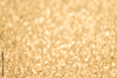 Abstract gold bokeh celebration background 
