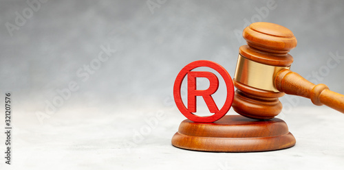 Judge gavel and red trademark sign photo