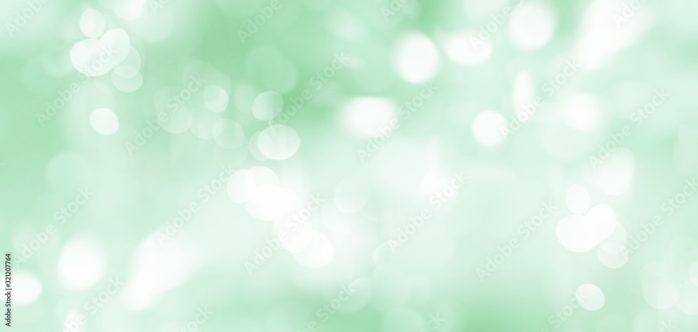 Obraz premium Abstract illustration of blurred light spots on green background. Blurry summer backdrop 