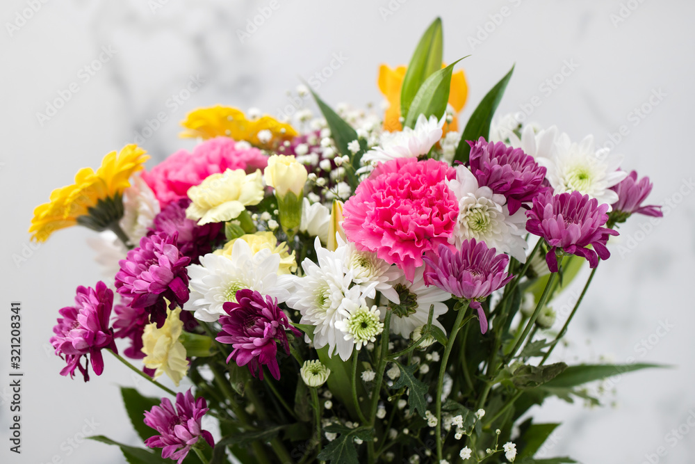 beautiful flowers on light gray background