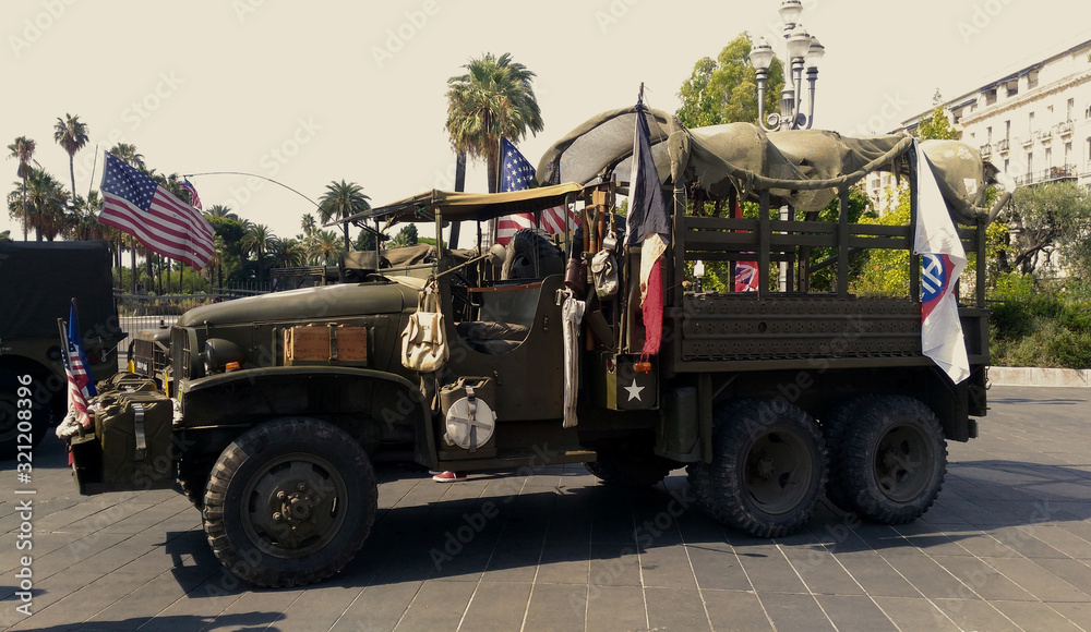 Old military vehicule in Place Massena, Nice