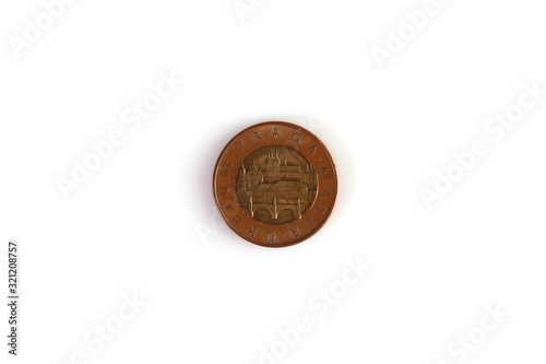 Numismatics. Old coin on a white background