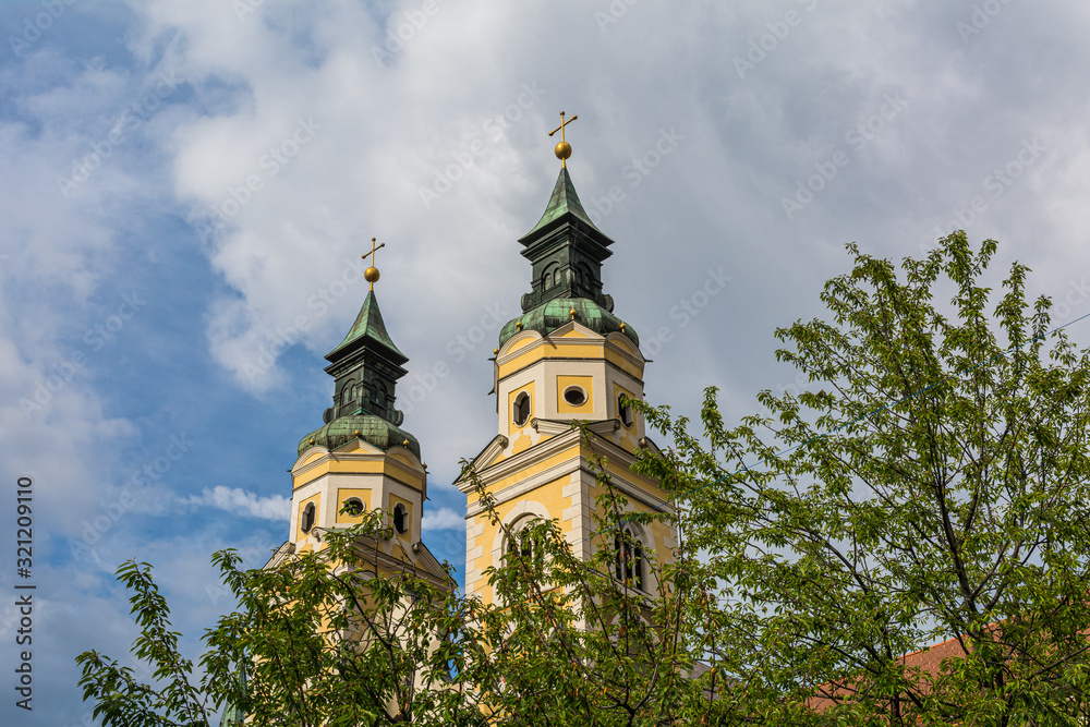 Fototapeta premium The Beautiful Cathedral of Santa Maria Assunta and San Cassiano in Bressanone. Brixen / Bressanone is a town in South Tyrol in northern Italy. May 25, 2019.