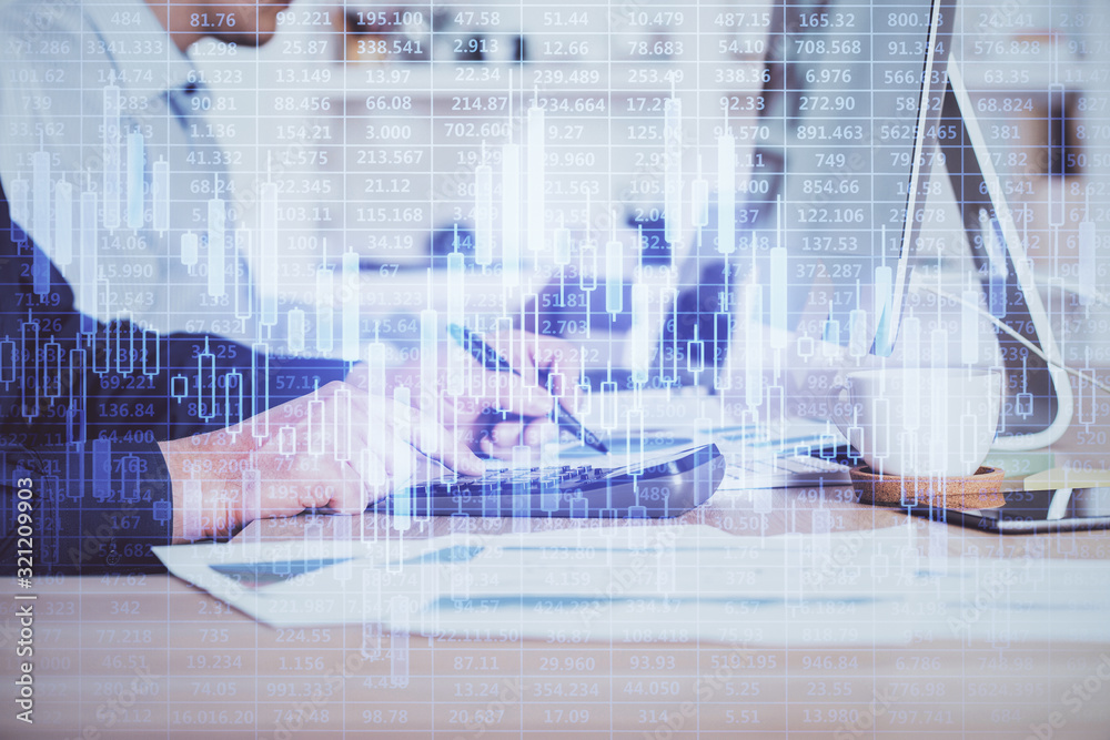Forex graph with businessman working on computer in office on background. Concept of hardworking. Closeup. Multi exposure. Forex graph with businessman working on computer in office on background. Concept of hardworking. Closeup. Multi exposure.