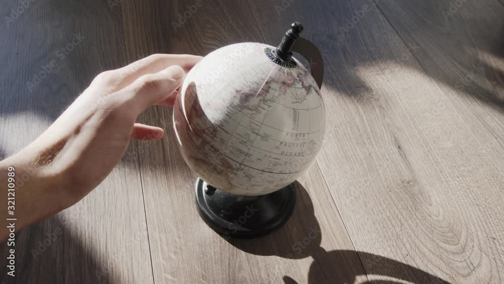 Globe getting turned in bright room_8