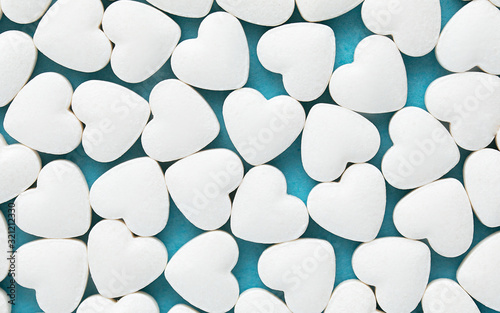 pills in the form of hearts on St. Valentine's Day. Pills of love. photo