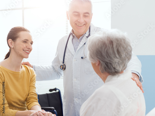 Doctor meeting a senior patient and her daughter