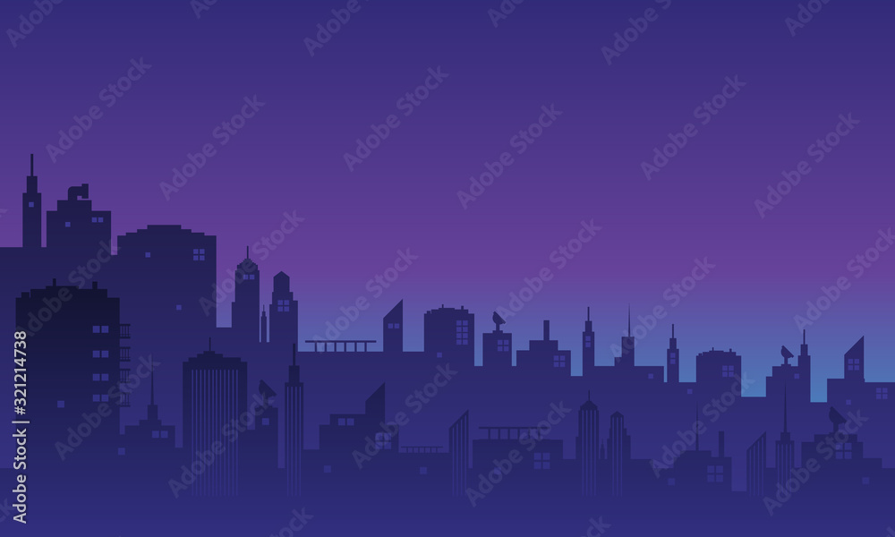 Silhouette of a city at night with many buildings mall