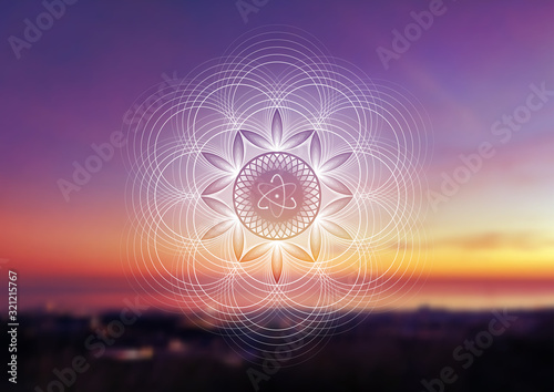 Vector template of banner with spiritual sacred geometry on blurred background with sky and sea, horizontal format; Fantastic mandala and atom; Poster for yoga, meditation, relax.
