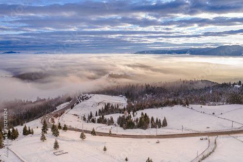 Pasul Tihuta, Romania seen from a drone early in a winter morning. 