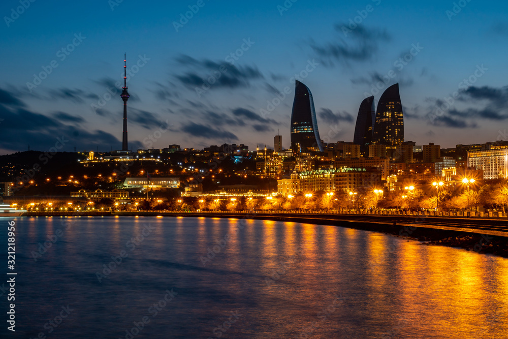 Φωτογραφία Night view of Baku with the Flame Towers skyscrapers