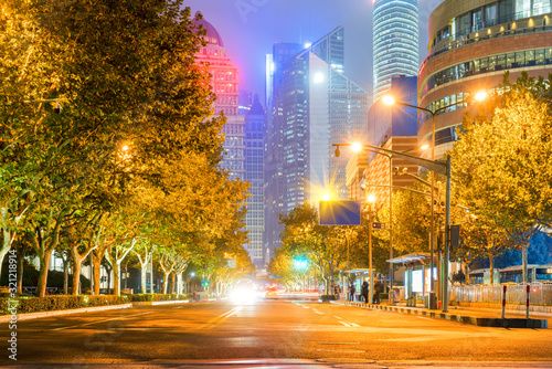 At night, city roads and skyscrapers in Shanghai, China