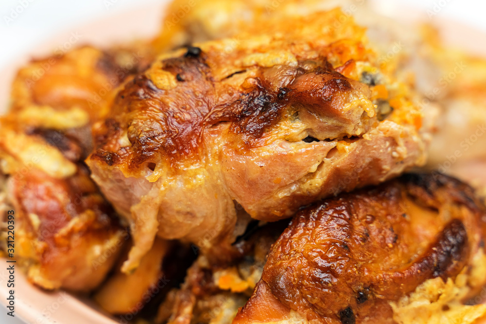 pieces of appetizing fried chicken close-up with a crispy crust lie on a plate pieces of appetizing fried chicken close-up with a crispy crust lie on a plate