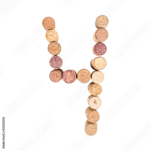 The number 4 is made from wine corks, close-up. Isolated on white background