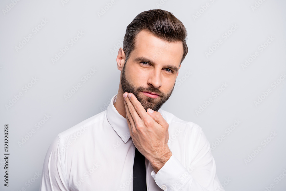 Closeup photo of macho business man touch groomed neat beard look mirror amazing results new after shaving cream wear white office shirt tie isolated grey color background Closeup photo of macho business man touch groomed neat beard look mirror amazing results new after shaving cream wear white office shirt tie isolated grey color background