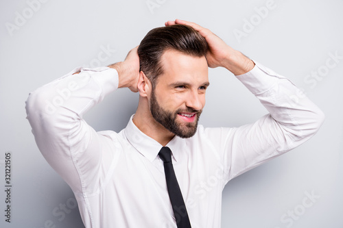 Closeup photo of young macho business man touch groomed neat hairstyle salon styling beaming smiling look empty space wear white office shirt tie isolated grey color background