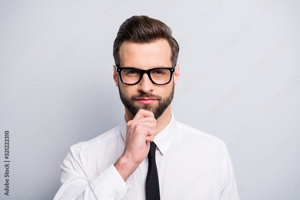 Closeup photo of attractive handsome business man investor looking doubtful think project idea arm on chin wear specs white office shirt tie isolated grey color background Closeup photo of attractive handsome business man investor looking doubtful think project idea arm on chin wear specs white office shirt tie isolated grey color background