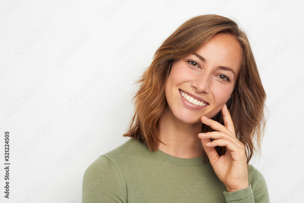 portrait of young woman with sweet smile portrait of young woman with sweet smile