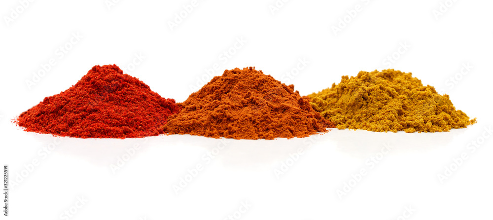 Three piles of spices. - obrazy, fototapety, plakaty 