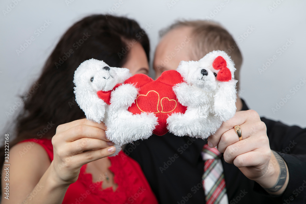 man and woman kiss each other. Valentine's day congratulation concept man and woman kiss each other. Valentine's day congratulation concept