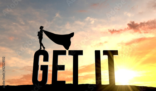 Fotografia Silhouette of superhero woman stood on the word get it