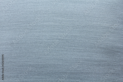 Brushed scratched metallic texture as a background