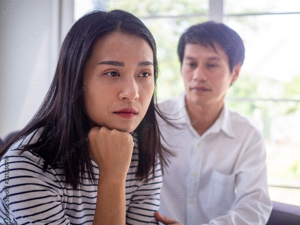 Women are putting coins in a piggy bank for a business that grows for profit and saving money for the future. planning for retirement concept Women are putting coins in a piggy bank for a business that grows for profit and saving money for the future. planning for retirement concept
