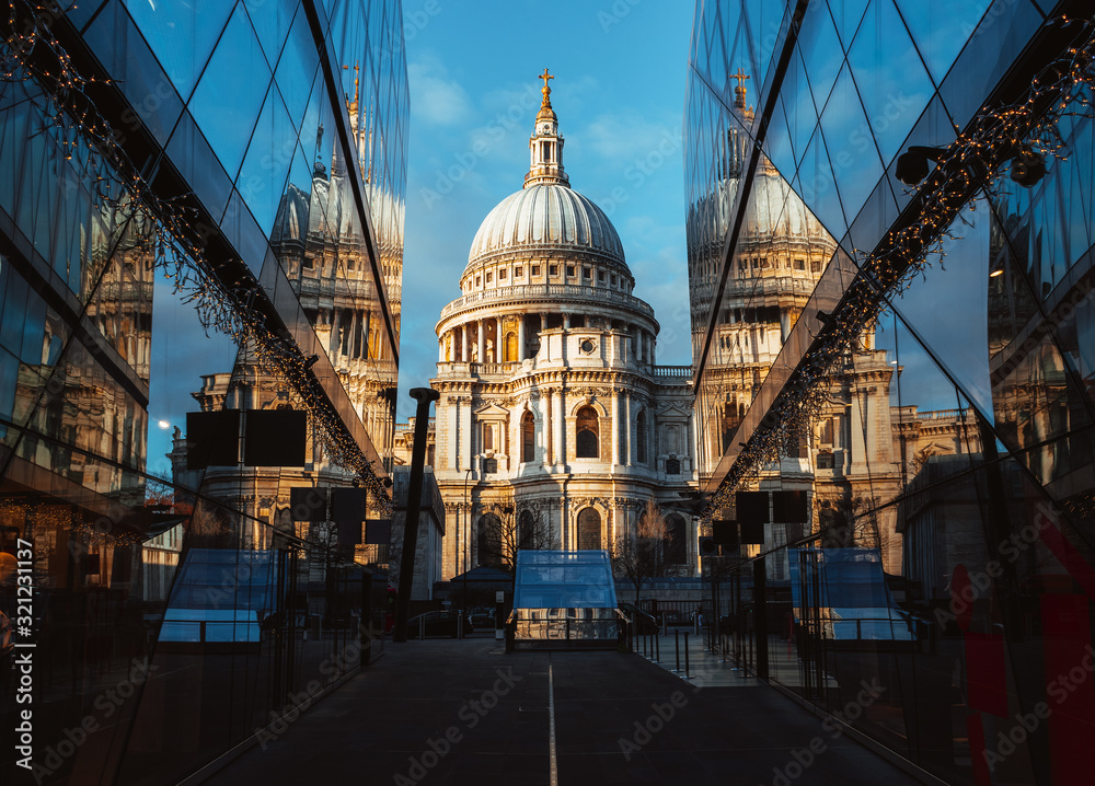 Fototapeta premium St Paul's Cathedral reflected in modern glass buildings, London