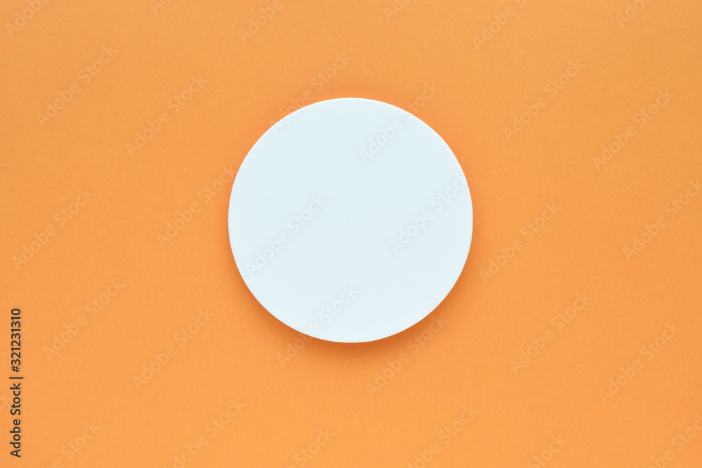 丸い円とオレンジ色の背景